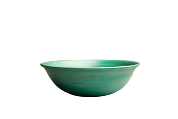 a green bowl sitting on top of a white table