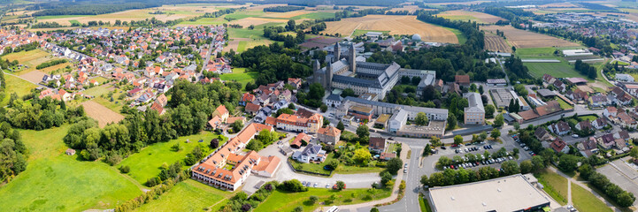 Obraz premium Aerial view around the old town in the city Schwarzach am Main, on an sunny spring morning