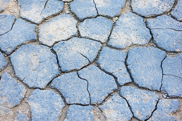 Obraz premium Cracked concrete surface showcasing industrial aesthetics details