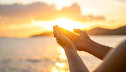 Open hands facing sun at sunset (1)