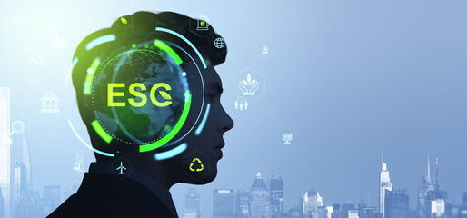 ESG concept with businessman's silhouette and green digital inte