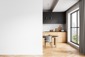 Modern kitchen interior with blank white wall for poster mockup or branding concept in stylish...