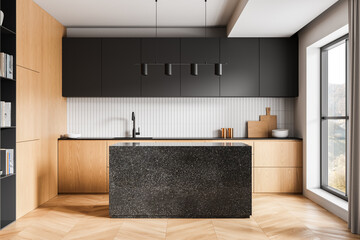 Modern interior kitchen design with wood cabinets, minimalist lighting, and a textured stone island...