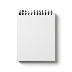 White blank spiral notebook with empty pages top view on white background. Office supply for school, business note or design concept.