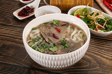 Vietnamese Pho Bo soup with beef and noodles