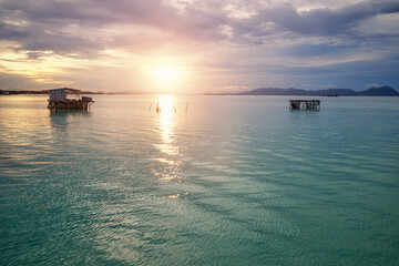 Scenic sunset over water, Semporna district, Borneo, Malaysia.