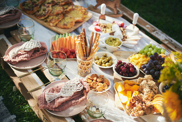 pallet with food in a park, holiday picnic