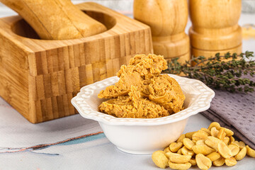 Crunchy peanut butter fat product