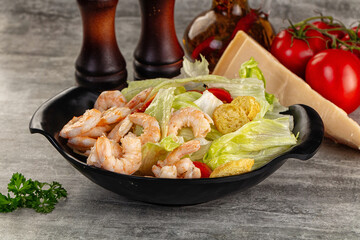 Tasty caesar salad with prawn