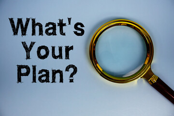 What's Your Plan? text with magnifying glass on blue background