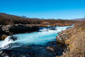 Bruarfoss is a hidden gem in Iceland, famous for its vivid blue water and delicate falls. A peaceful stop along the Golden Circle, perfect for photographers and hikers.