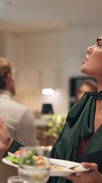 Fight, waiter and frustrated with woman in restaurant for conflict, poor quality and wrong food order. Service fail, negative rating and critic feedback with people at table for fine dining problem