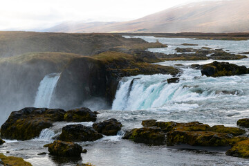 Godafoss, the “Waterfall of the Gods,” is a wide, elegant waterfall in North Iceland, rich in history and natural beauty.
