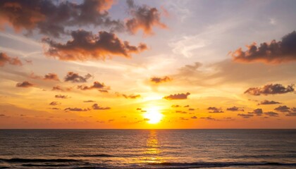 Sunset over the ocean with dramatic clouds