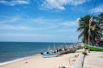 View landscape clouds sky wave in sea ocean and local thai fishers people stop boat ship waiting catch fish marine life on Tabsakae Beach at Thap Sakae on June 2, 2025 in Prachuap Khiri Khan, Thailand