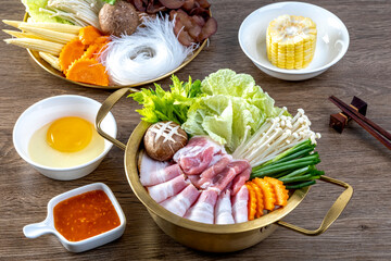 Sukiyaki Japanese food shabu shabu set up on the wooden table