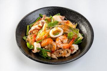 fried  sukiyaki pork and seafood with vegetable and sukiyaki sauce, Thai street food