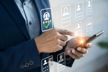 Person using smartphone to select a candidate with a confirmed profile and five star rating