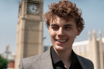 man in classic suit in the garden on the street