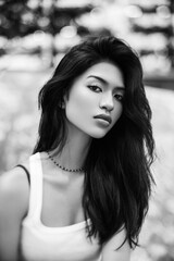 Black and white portrait of a Thai girl in the park