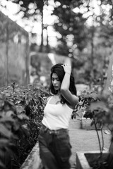 Black and white portrait of a Thai girl in the park