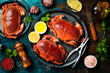 Delicious boiled large crabs with claws, served with lemon, salt and spices. A great appetizer with beer or wine.