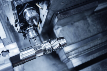 Precision cnc milling machine with metallic components in industrial setting