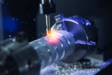High-precision cnc milling machine in action with metal cutting © Parilov