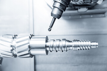 Cnc milling machine crafting precision metal components of turbine wheel in oil