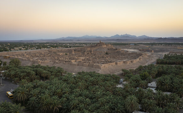 Aerial view of the ancient Arg-e Bam citadel, a city constructed of mud bricks standing proud against the horizon, Bam, Kerman Province, Iran.