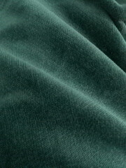 Deep Green Velvet Fabric Texture Background, Luxurious and Soft Material for Design Projects