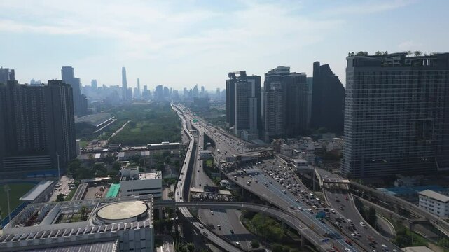 The Busy Road Traffic Over The Si Rat Expressway In Bangkok, Thailand. Aerial Drone Shot