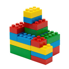 A vibrant, multi-colored stack of red, yellow, blue, green plastic construction building blocks, abstractly stepped, isolated on an immaculate white studio background with crisp, shadowless lighting