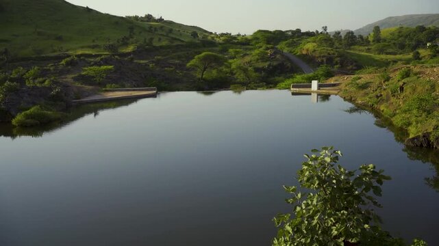 Spectacular view of Alsigarh Lake in Rayta Hills, with a beautiful reflection in the water. Udaipur, Rajasthan, India.
