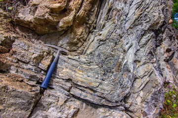 Geological Anticline Fold with Hammer