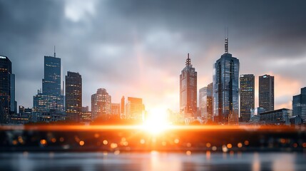 Obraz premium Urban Symphony: A breathtaking cityscape basks in the warm embrace of the rising sun, its skyscrapers reaching for the sky amidst a symphony of architectural brilliance. The scene.