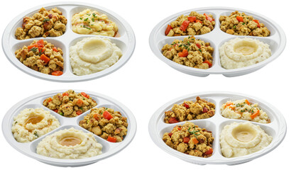 Food tray with four compartments featuring chicken and mashed potatoes  