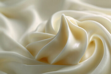 Swirl of creamy, glossy material. A mesmerizing vortex of smooth curves and soft light, evoking a sense of luxurious indulgence and artistry.