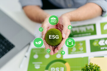 Adult hands cradling a vibrant green moss ball with green icon concept symbolizing global...