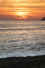 Soft sunset light over the ocean – a peaceful seascape that feels calm, warm, and timeless.

