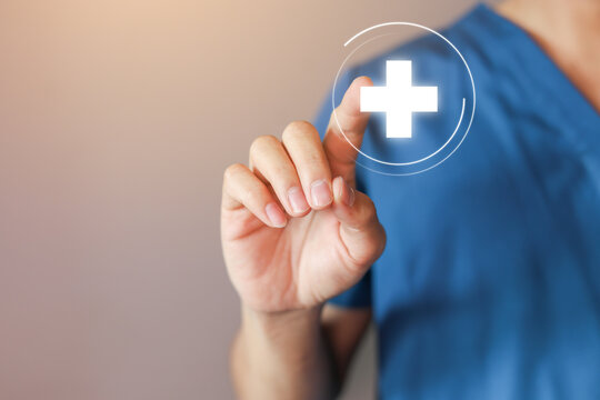 close up young expertise doctor man hand press on medical sign icon over background with copy space for healthcare and good lifestyle concept