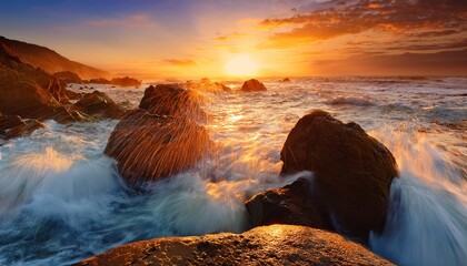 Obraz premium fantastic big rocks and ocean waves at golden sundown