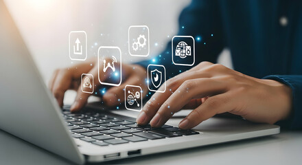 Person typing on laptop with augmented reality interface symbolizing digital transformation and technology