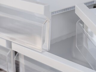 Stack of fridge drawers. Close-up.