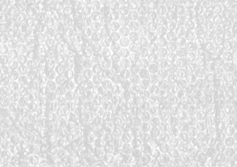 Textured bubble plastic wrap surface with gritty, tactile feel. Perfect for background textures, retro packaging effects, or recycled material aesthetics.