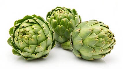 Obraz premium Three Fresh Green Artichokes Isolated on White Background: Vibrant, Healthy, and Ready to Cook.