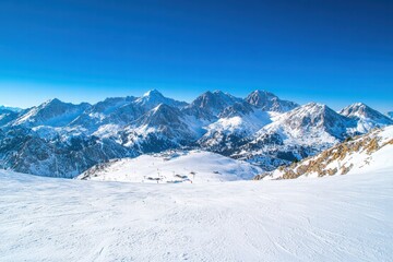 Winter peaks and valleys with clear sky