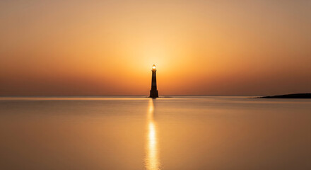  Lone Lighthouse Stands Silhouetted