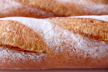 Close-up of a baguette bread. Texture of the bread. Macro shot.