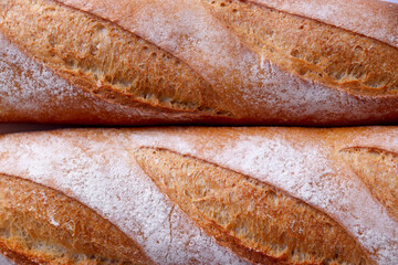 Close-up of a baguette bread. Texture of the bread. Macro shot.